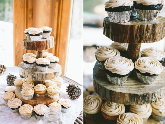 Rustic wooden cupcake stand with buttercream frosting
