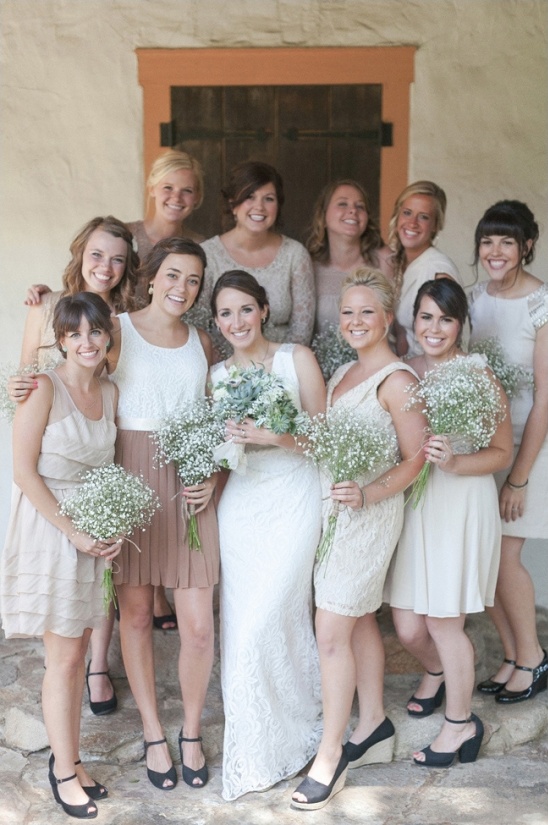 cream bridesmaid dresses with baby's breath bouquets