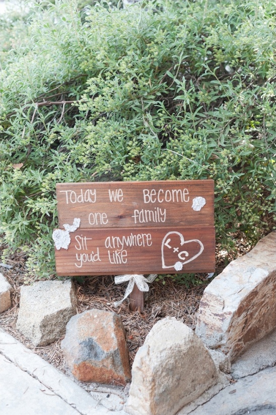 wooden ceremony welcome sign