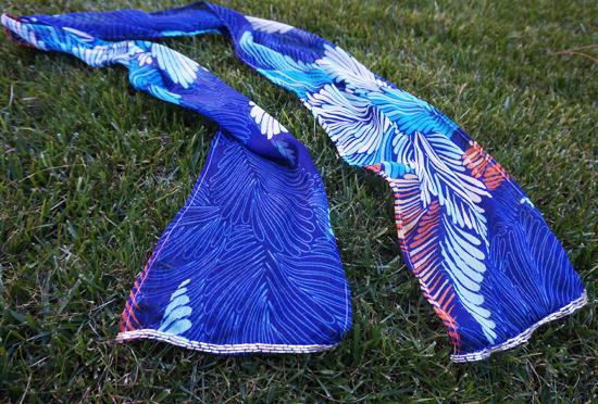 Blue floral print chiffon scarf on grass