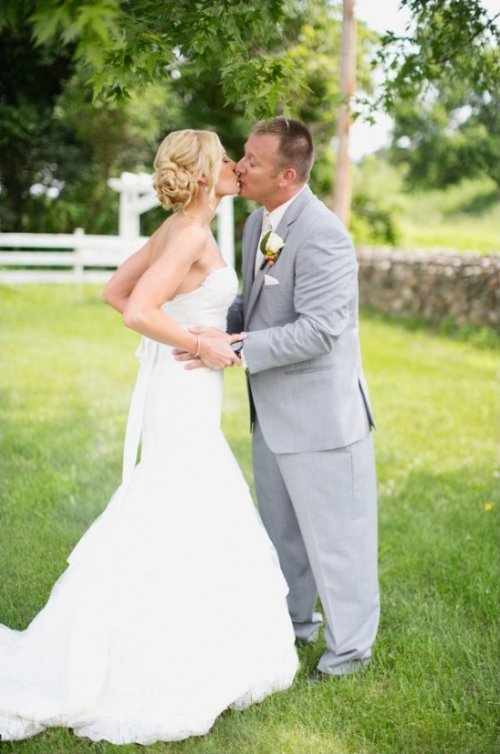 Bride and groom sharing a kiss on their wedding day