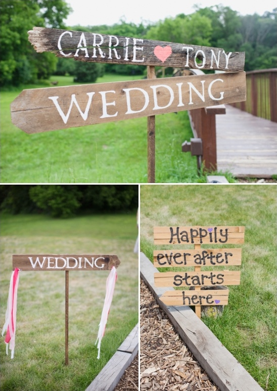 Rustic wedding signs point the way to happily ever after