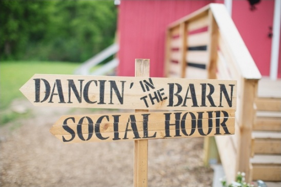 Directional sign for dancing and social hour at the barn