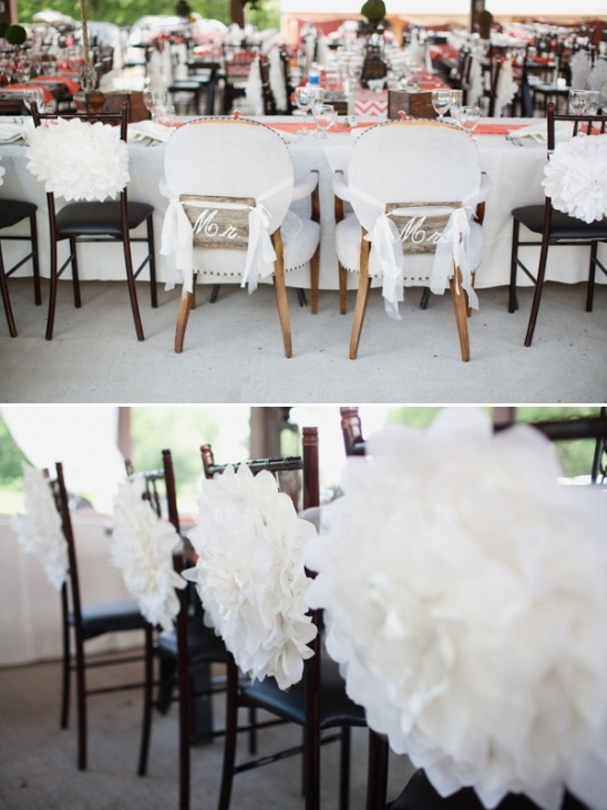 Wedding chairs with Mr signs and white decorations
