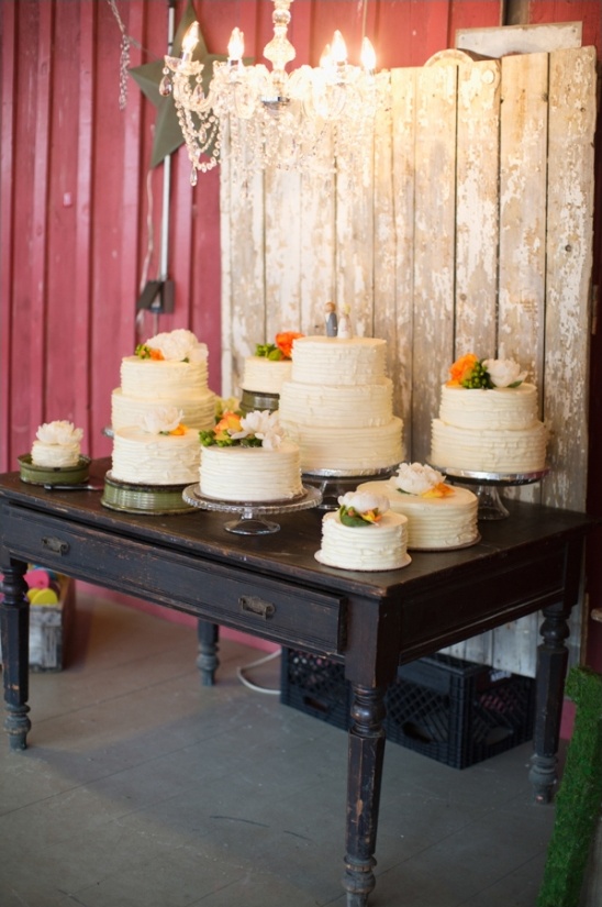 Wedding cake display on a vintage table backdrop