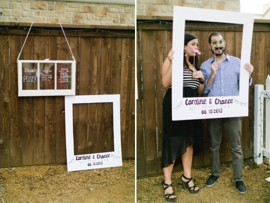 Couple posing for photo booth