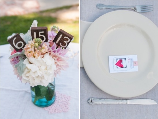 Wedding table centerpiece with flower arrangement and place card
