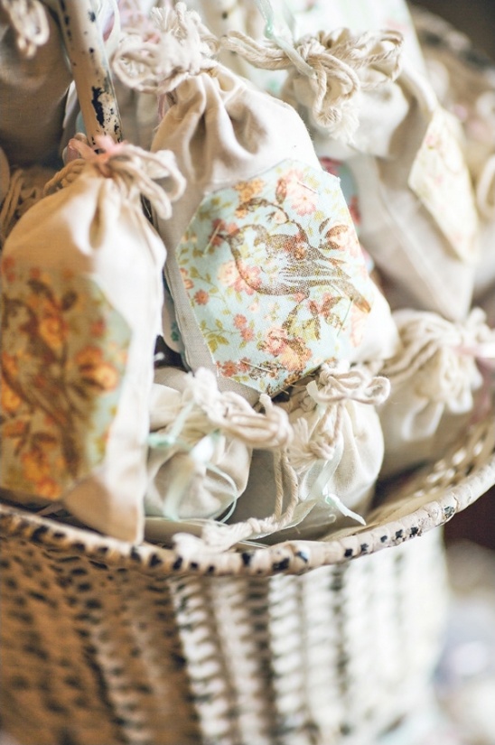 Vintage bird print fabric favor bags in basket