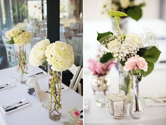 Elegant white hydrangea wedding centerpieces in tall glass vases