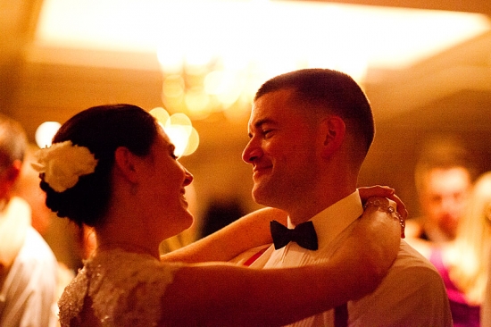 Bride and groom share their first dance at wedding