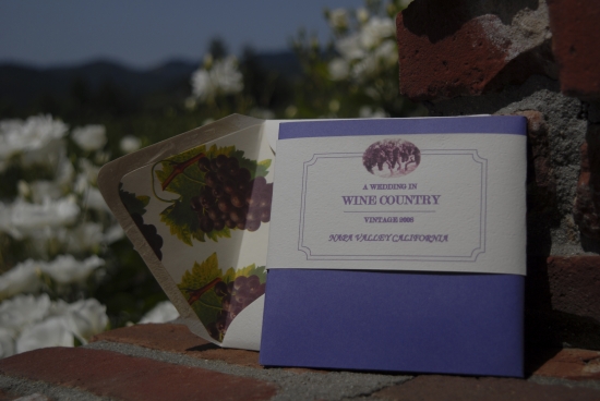 Wine country wedding invitation with grape design