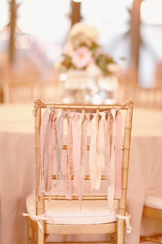 gold chairs with ribbons