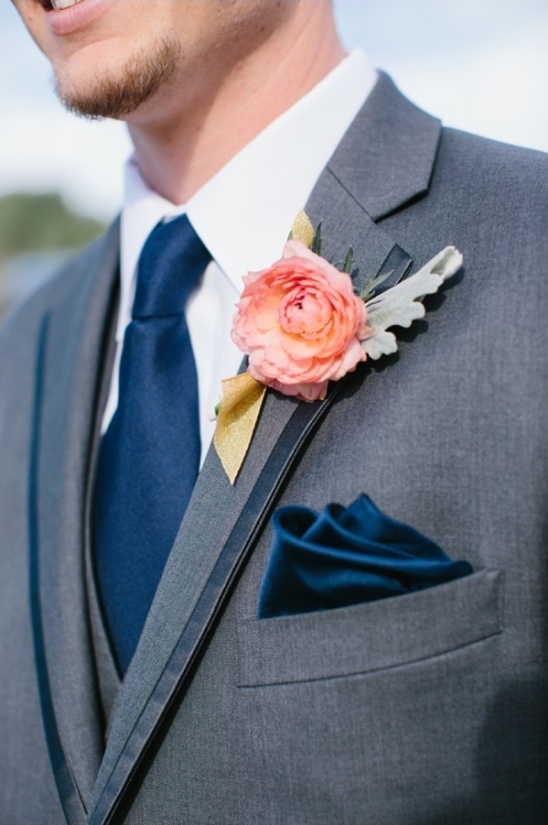 navy blue and peach boutonniere