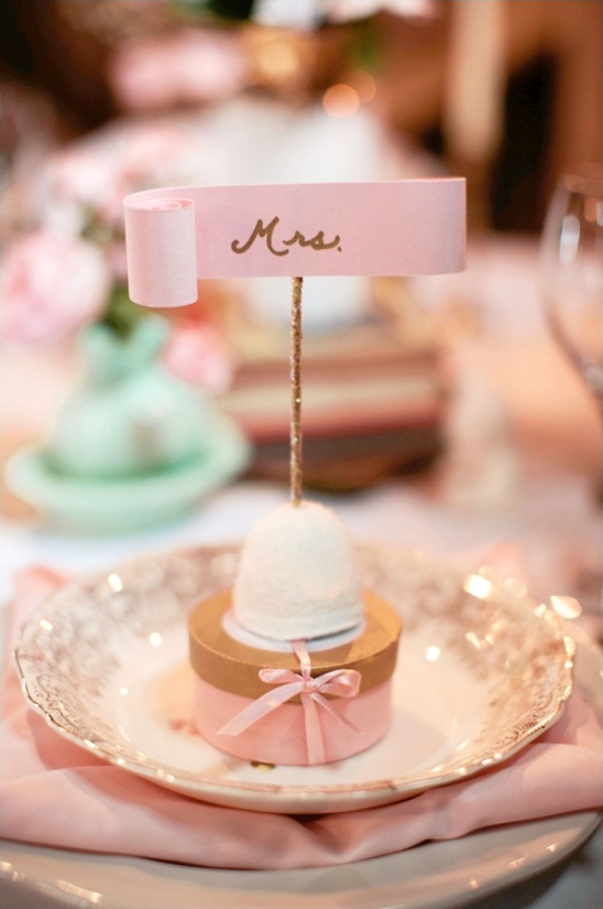 Elegant pink wedding table setting with Mrs  place card