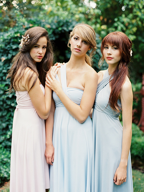 Three bridesmaids in pastel infinity dresses