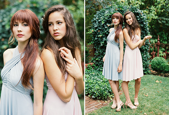 Two women in pastel infinity dresses, posing outdoors