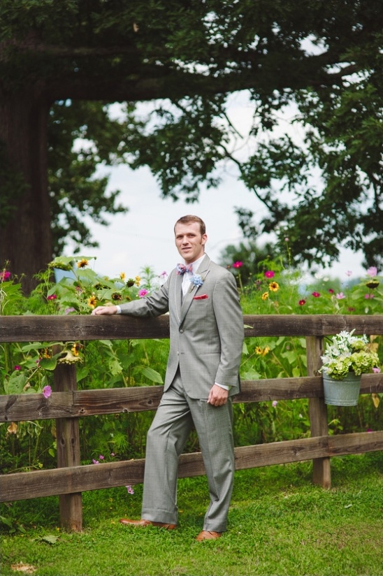 groom in gray suit and bow tie