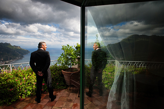 Man in suit enjoys scenic coastal view