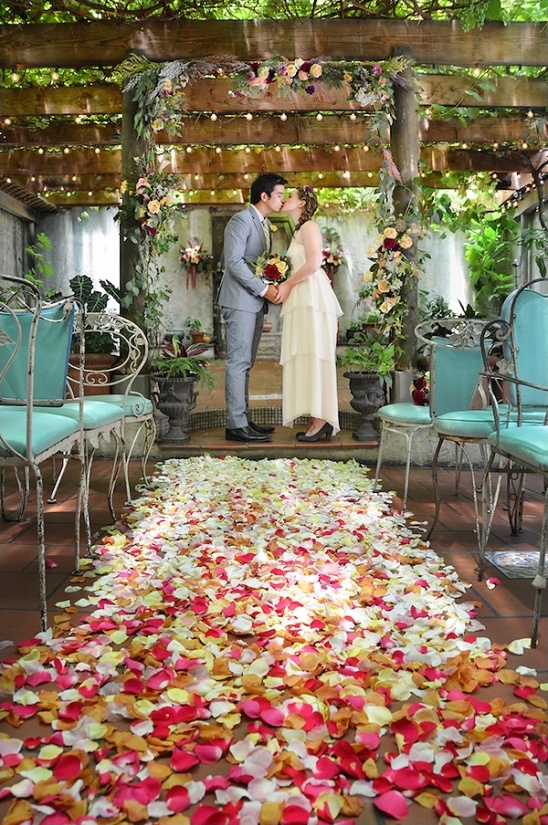ombre petal covered ceremony aisle