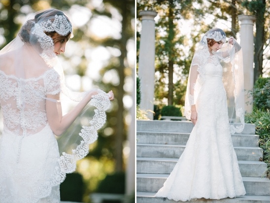 Elegant bride in a lace wedding dress and veil