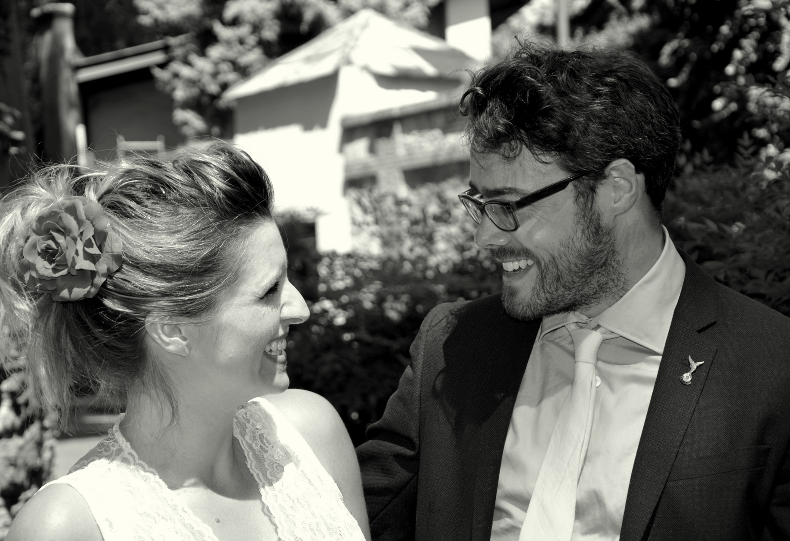 Smiling couple in love on a wedding day looking at each other