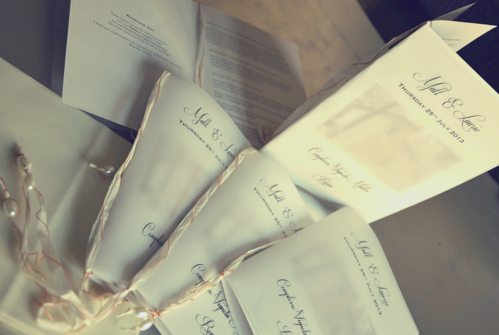 Wedding invitations and programs, beautifully designed and arranged