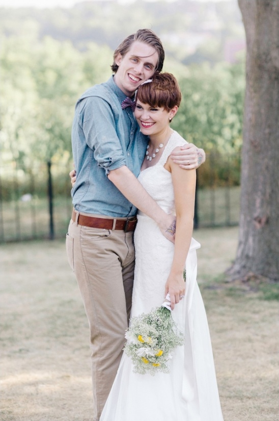 Happy couple embraces joyfully on their wedding day