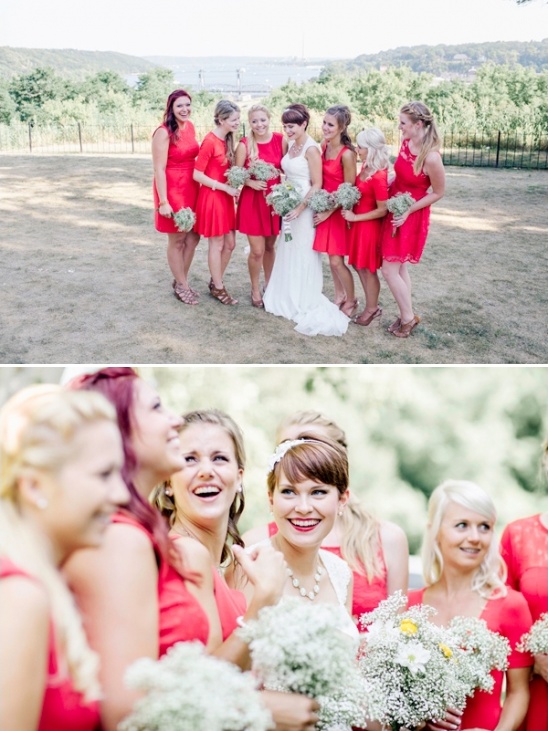 Bride and bridesmaids in red dresses, smiles and joy