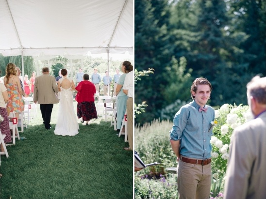 Bride walking down the aisle with groom waiting at outdoor wedding