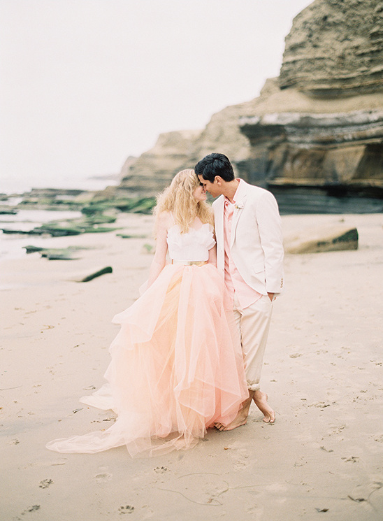Romantic couple on the beach enjoying their special wedding day