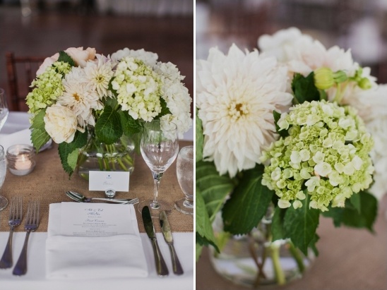 Elegant white and green floral centerpiece on wedding table
