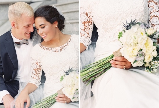 Happy couple embracing, bride holding a lovely bouquet