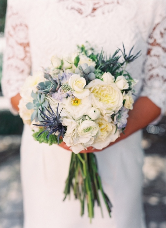 Elegant white and blue bridal bouquet with succulents