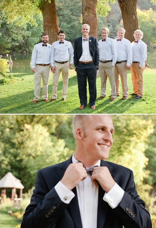 Groom and groomsmen in bow ties at outdoor wedding