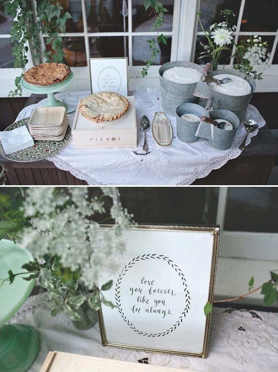 Rustic wedding dessert table with pies and decor