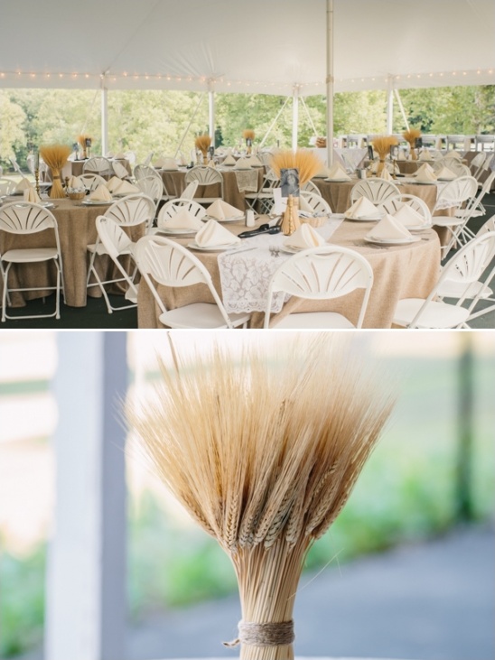 Rustic wedding reception with wheat centerpieces