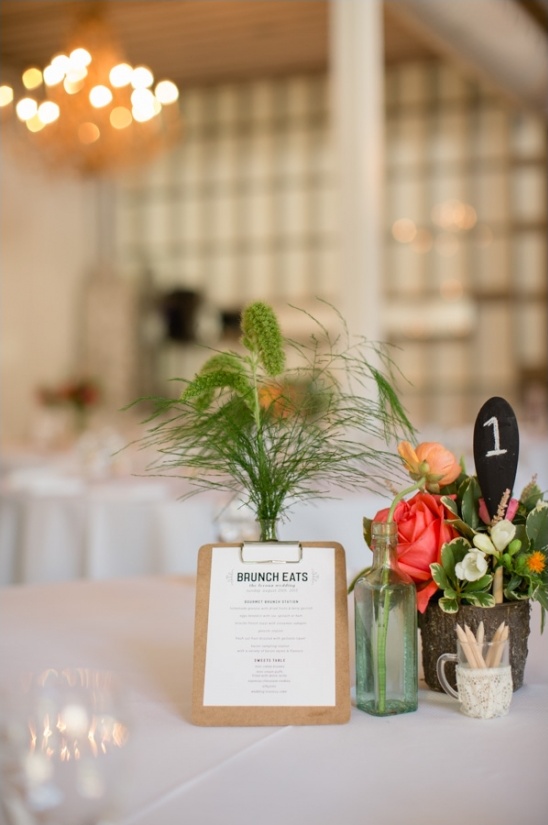 Rustic brunch menu table setting with flowers