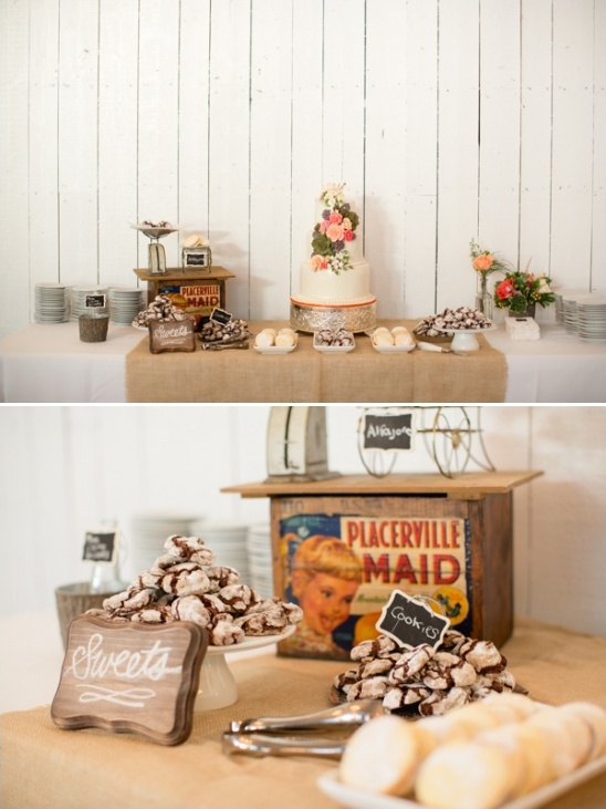 Rustic wedding dessert table with cake and cookies