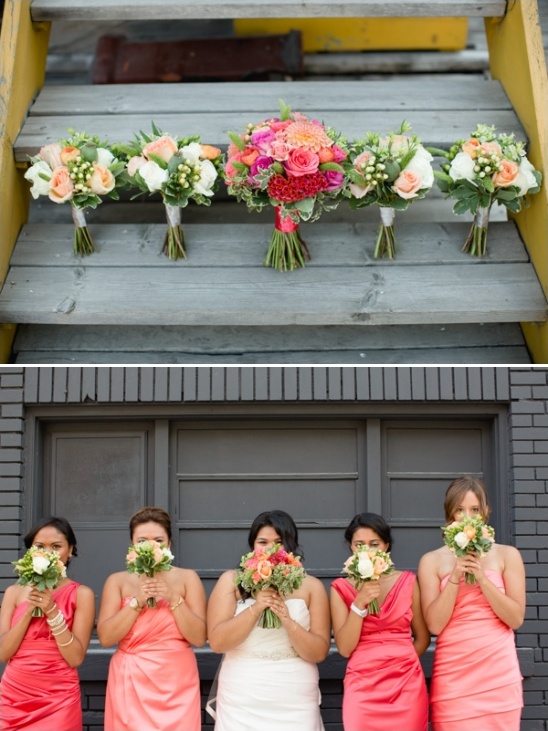 Bridesmaids in peach dresses holding wedding bouquets