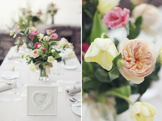 Elegant floral table setting with roses and tulips for a wedding
