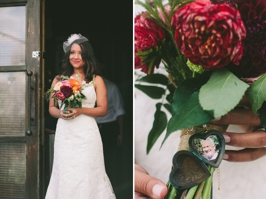 Bride holding flowers with a heart-shaped locket on her wedding day