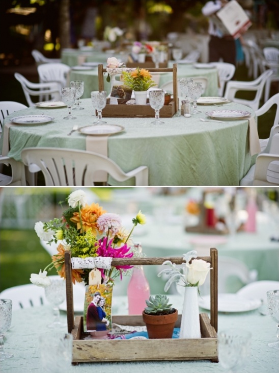 Rustic wedding table setting with wooden crate centerpiece