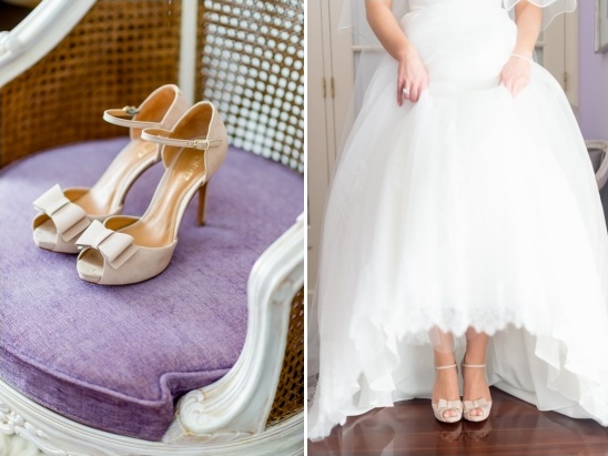 Elegant beige bridal shoes with bows on purple chair