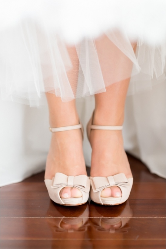 Elegant beige bridal peep-toe heels with bows