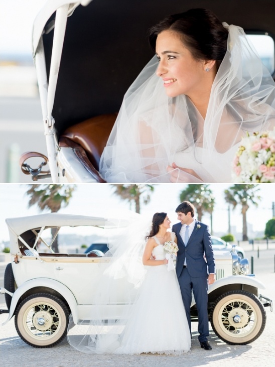 Bride and groom in vintage wedding car