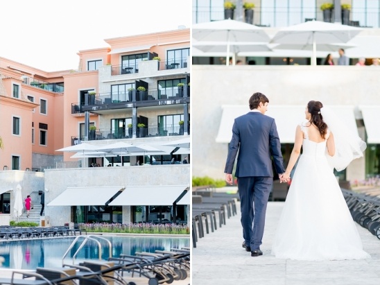Couple holding hands, walking towards a luxury hotel pool