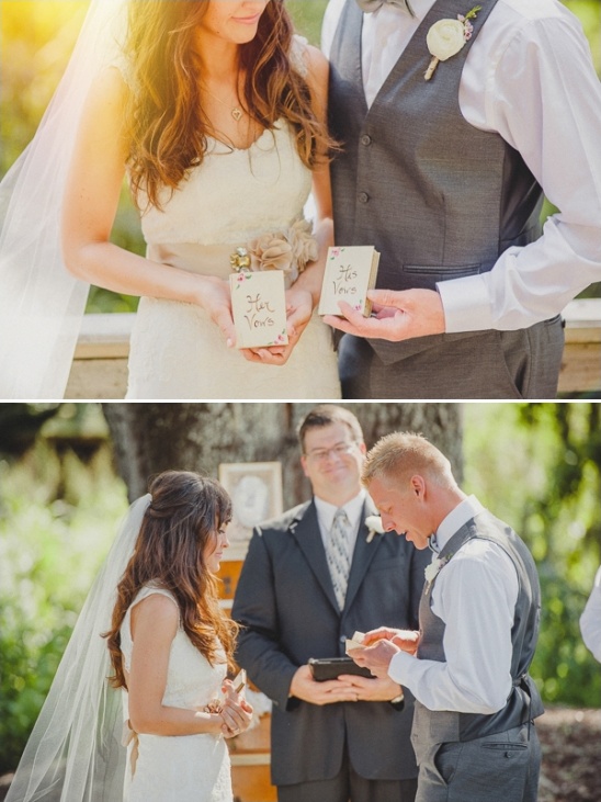 Bride and groom reading their vows at wedding ceremony