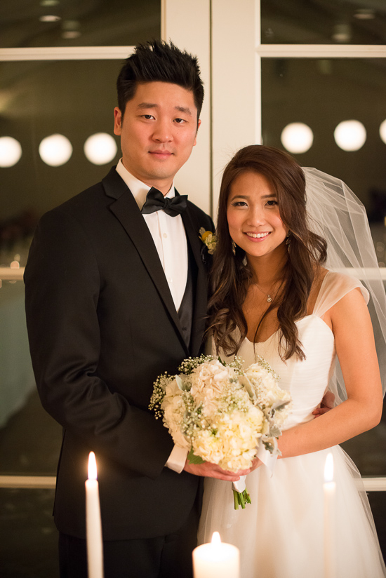 Asian couple on their wedding day, smiling happily