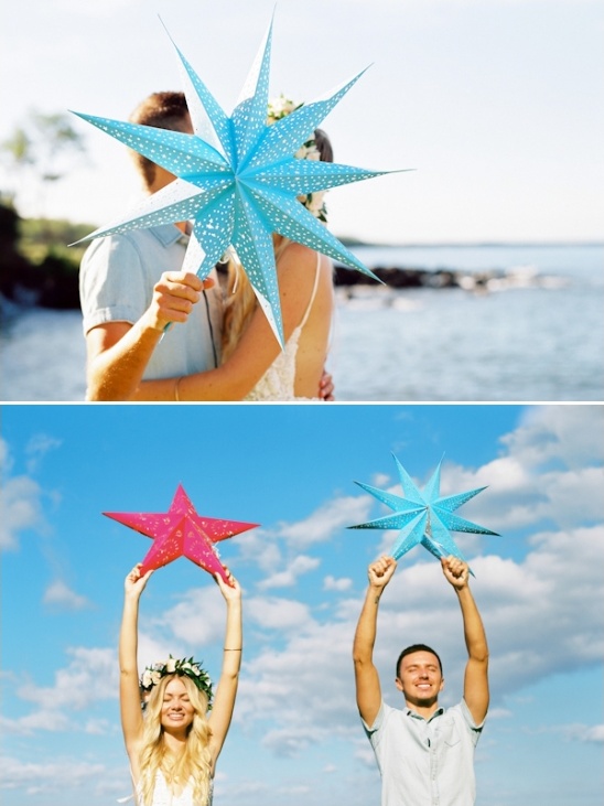 Couples celebrating with colorful star decorations in the sky