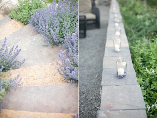 Stone steps with lavender and candlelit wall in the garden